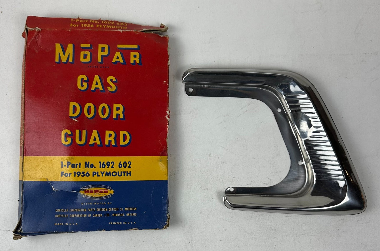 1956 New Old Stock Mopar Gas Door Guard Plymouth Models #1692602