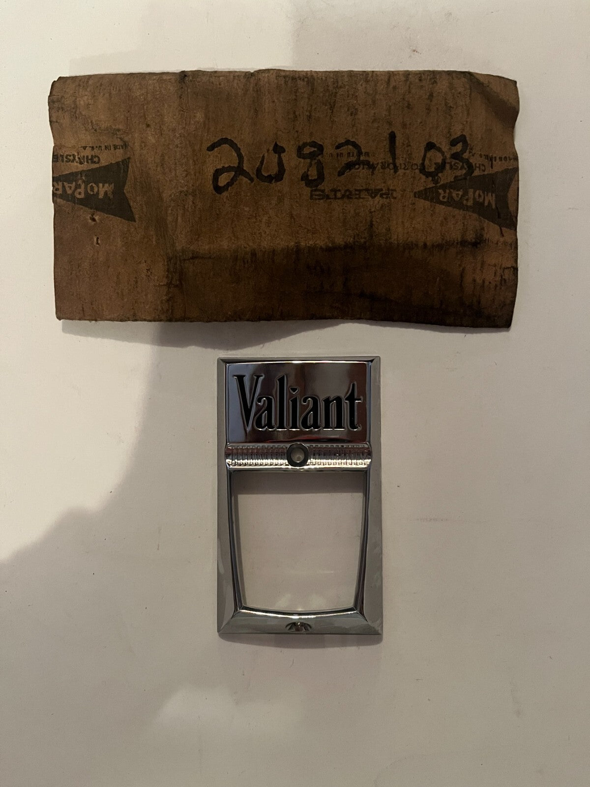 New Old Stock Mopar Hood Lock Medallion 1960-61 Plymouth Valiant Models #2082103